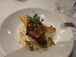 Plated dish at The Winery Restaurant, showcasing culinary finesse