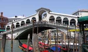 The iconic stone Rialto Bridge spanning the Grand Canal