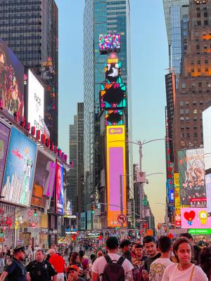 Times Square at night with glowing billboards