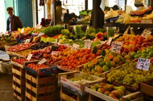 Vibrant fruit and vegetable stalls at the Rialto Market