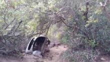 Decades-old car frame rested in canyon along Car Wreck Trail