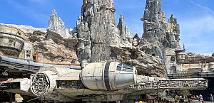 Entrance to Star Wars Galaxy's Edge showing rockwork and ships
